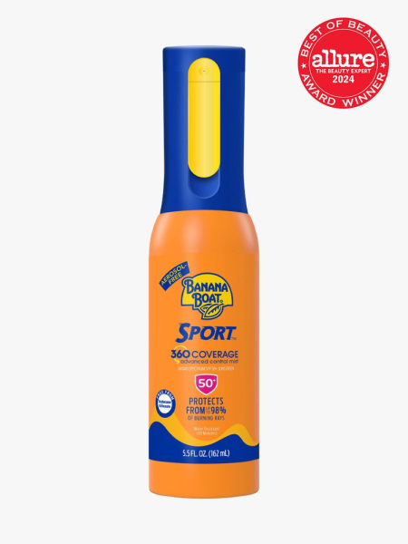 sunscreen mist in branded orange and blue bottle on light gray background with red and white 2024 allure best of beauty seal